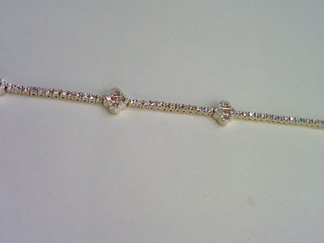 14KT 1.77-1.80CT D-BRACELET BAGUETTES "CLOVER LEAF"