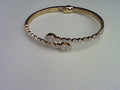 10KT 0.98CT D-BYPASS BANGLE BAGUETTES PEAR""