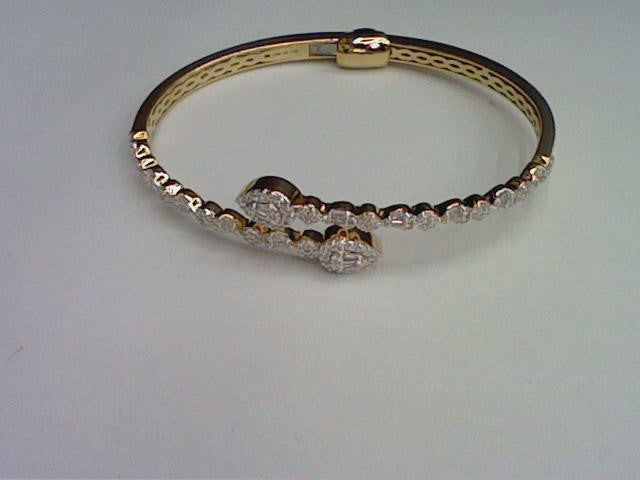 10KT 0.98CT D-BYPASS BANGLE BAGUETTES PEAR""