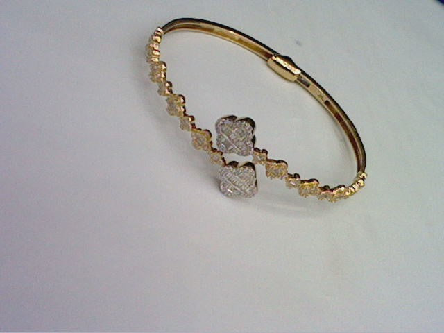 10KT 0.80CT D-BYPASS BANGLE