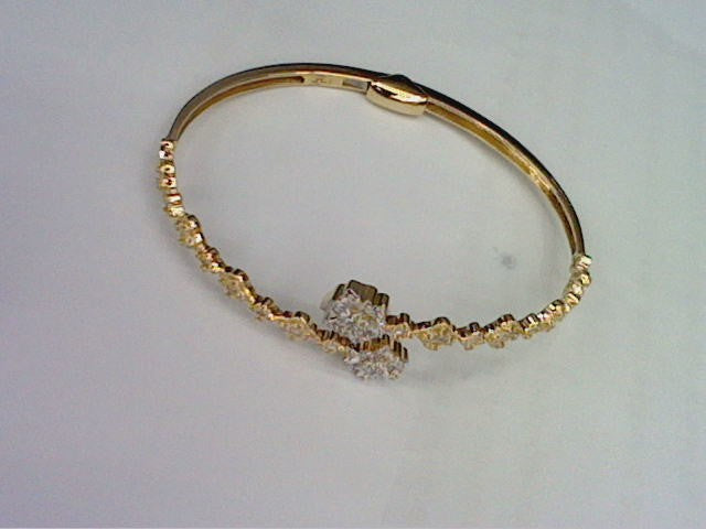 10KT 0.67CT D-BYPASS BANGLE